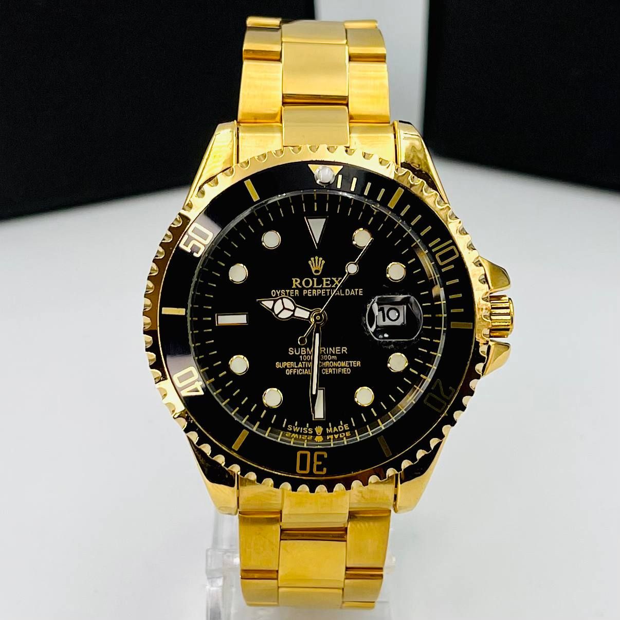 Rolex submariner black gold and blak