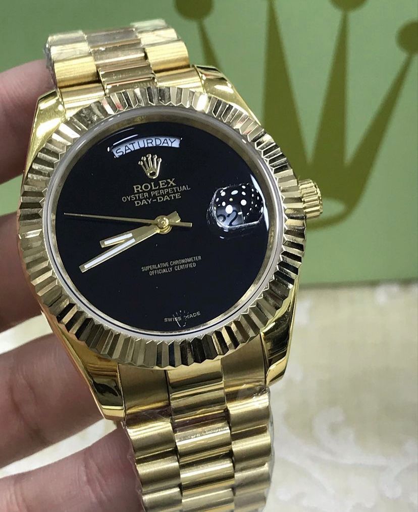 Rolex roma black and gold