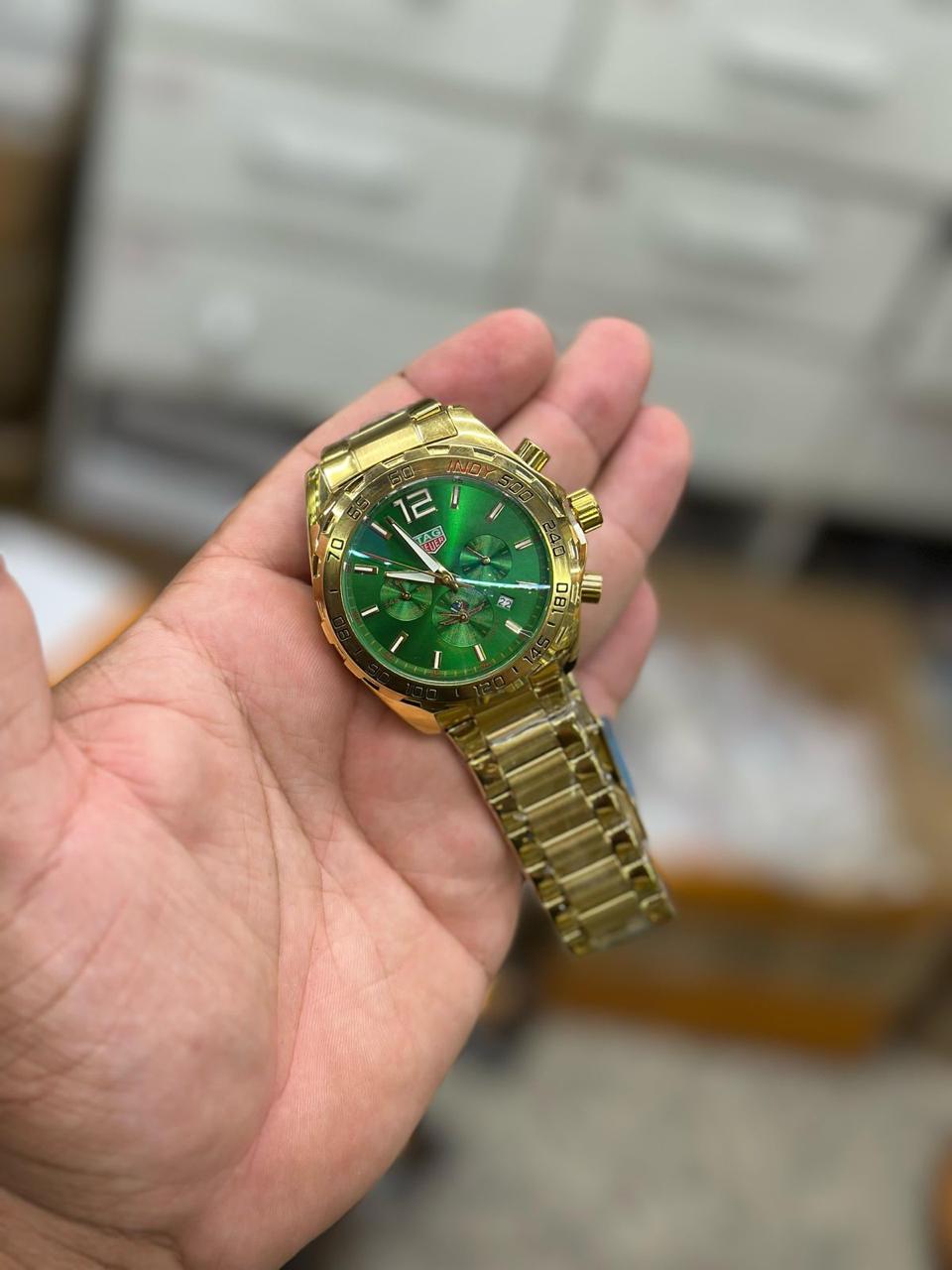 Tag heuer carrera gold and green