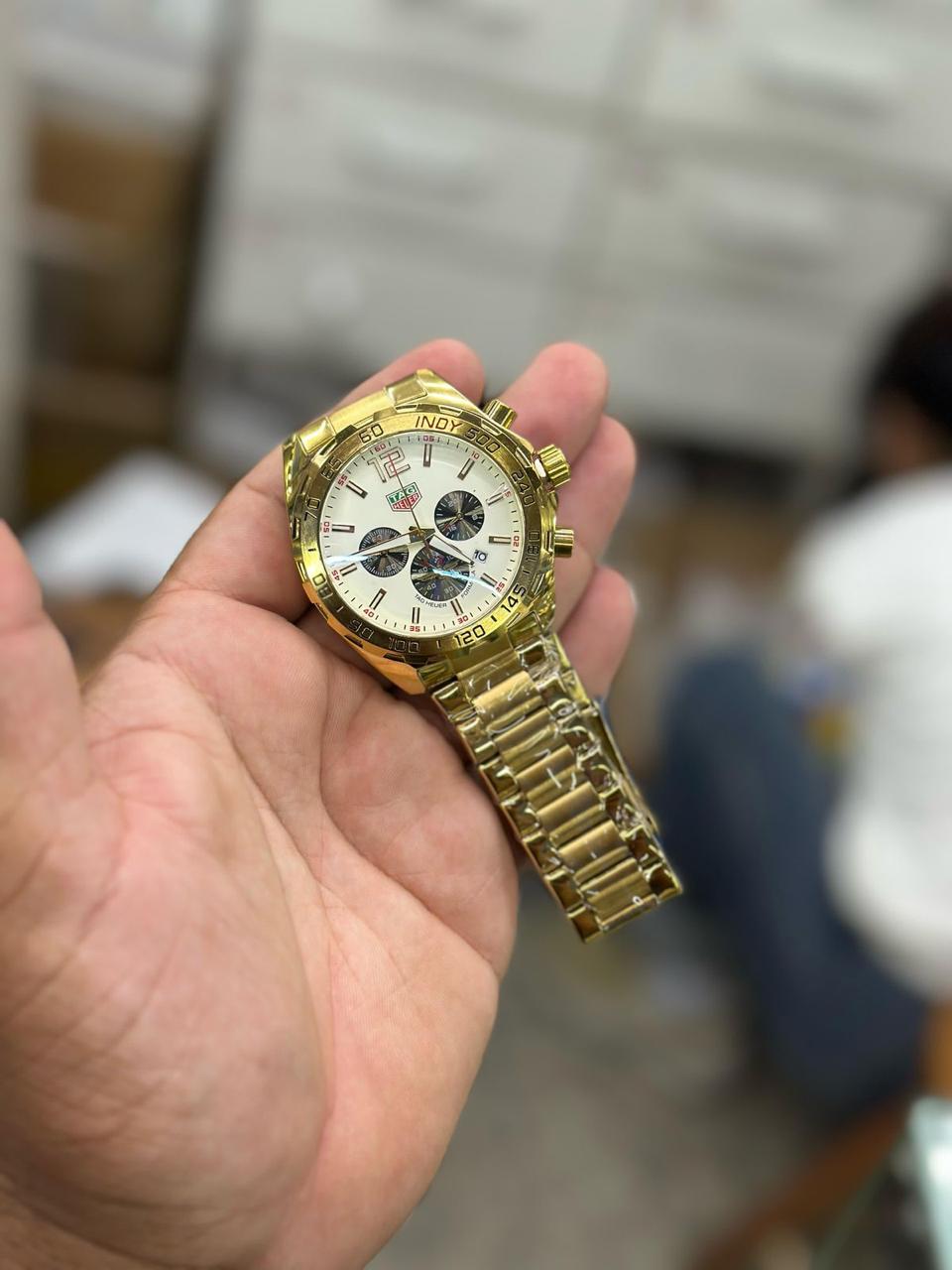 Tag heuer carrera gold and white