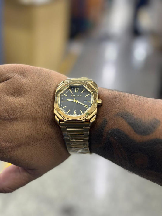 Bvlgari metal gold and black