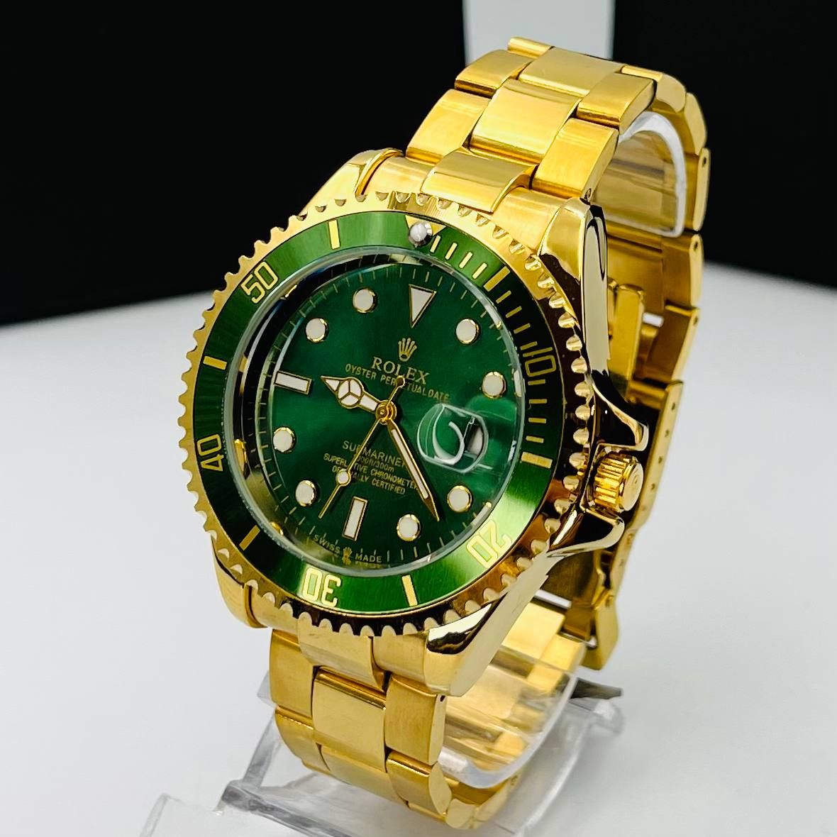 Rolex submariner black gold and green