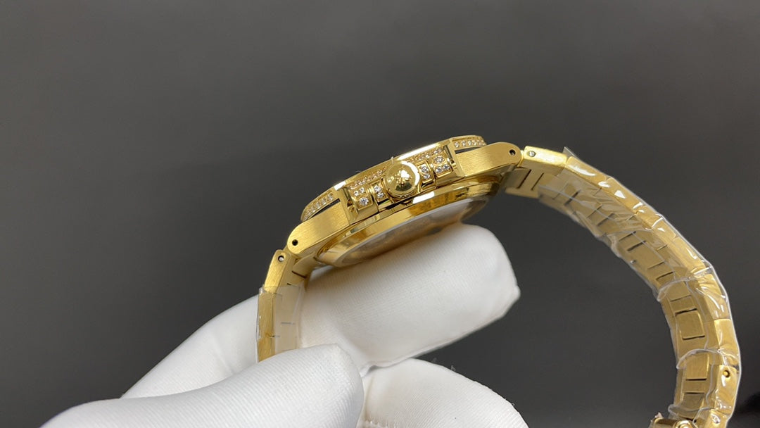 Patek Philippe Nautilus 7010 – “Gold Iced Out” (aftermarket).