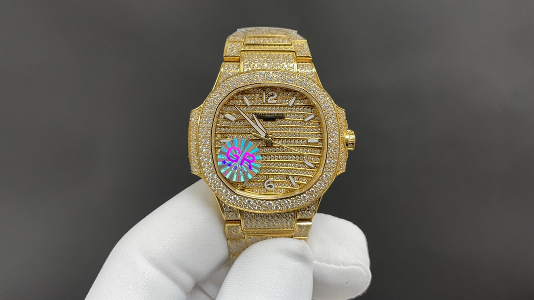 Patek Philippe Nautilus 7010 – “Gold Iced Out” (aftermarket).